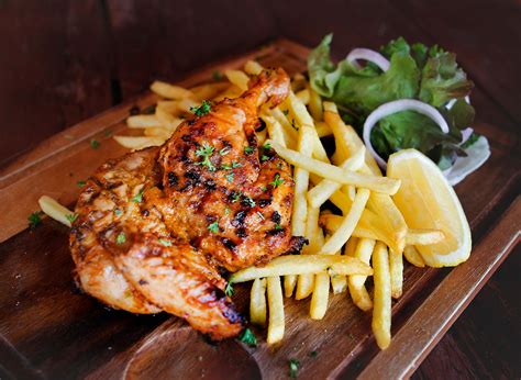 Peri peri grill - Jun 4, 2019 · Grill in a hot griddle pan with the lemon halves (alternatively cook the chicken on a barbecue) for 7-10 minutes per side then transfer to the oven (pre-heated to 180ºc) and cook for a further 20 minutes or until the chicken is cooked through. Squeeze over the grilled lemon juice and serve. 